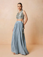 Women Powder Blue Brocade Sleeveless Crop Top With Pleated Skirt